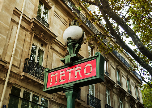 Paris, France. October, 2022. Famous red metro station sign in Paris