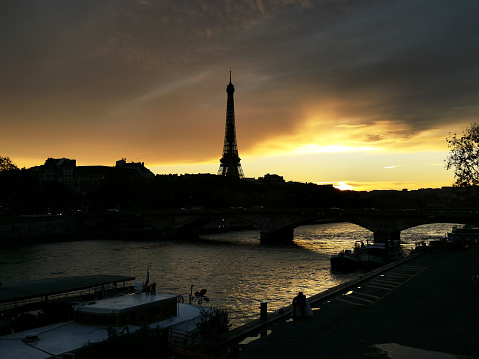 Paris, France, October, 2022. The Eiffel Tower seen from the Champs Elysées at sunset