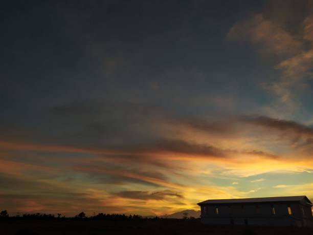 istock Beautiful Sunset in the Vast Grassland 1449585421