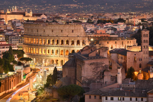 rome, italy view towards the colosseum - rome coliseum night famous place imagens e fotografias de stock