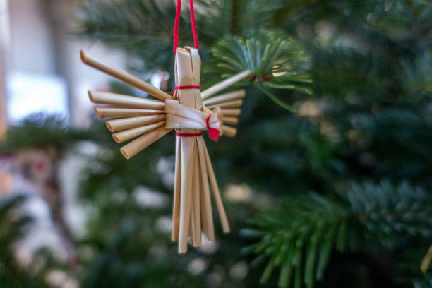 straw angel on christmas tree