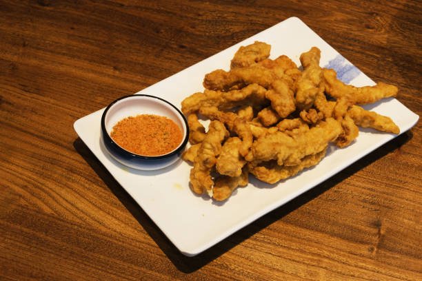 istock fried crispy pork meat. Chinese snack food 1449590277