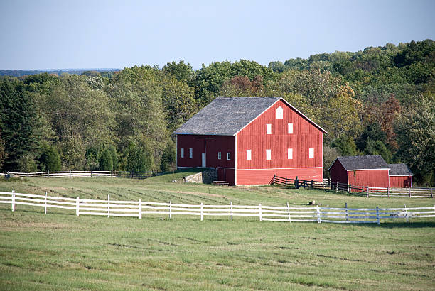 istock Red barn and white fence 144959201