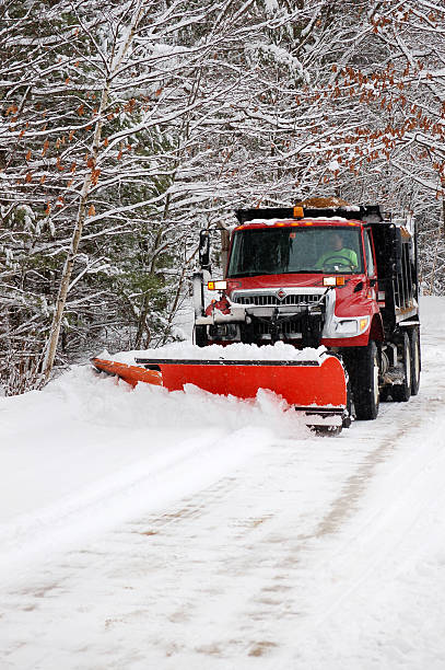 istock Red snow plow working a snow bank 144959520