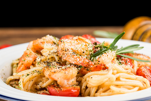 A plate of Italian Seafood  shrimp noodles