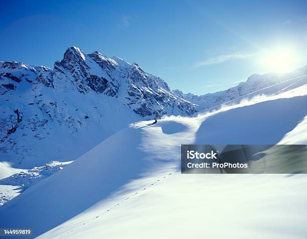 Snowboarding In The Alps Stock Photo - Download Image Now - Activity, Arlberg Mountains, Austria