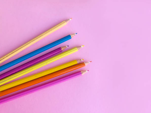 istock Colorful pencils with copy space on pink  background 1449600273