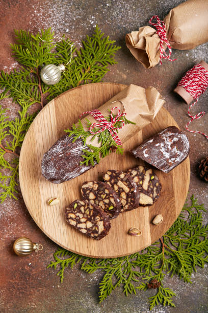 istock Chocolate salami cake with pistachio nuts, walnuts and cookies 1449604989