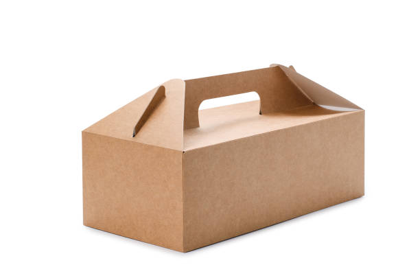 istock Closed cardboard box (container) with a handle on a white background. Eco-friendly paper packaging. 1449606556