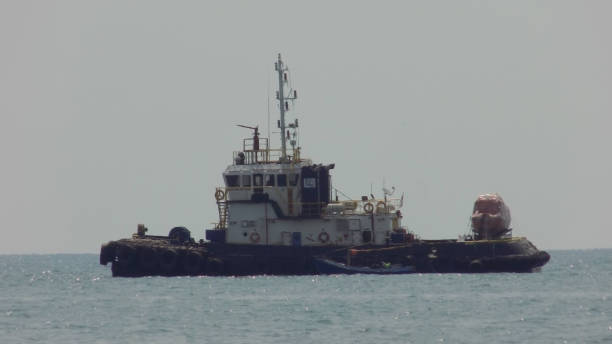 istock A ship is seen sailing on the beach 1449606965