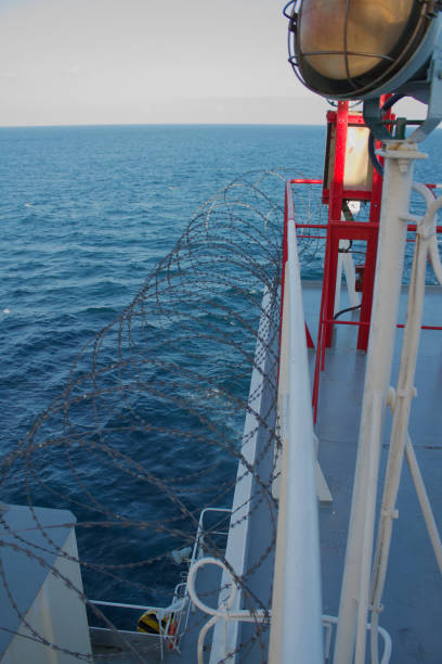 istock Vessel hardening is done with razor wire and wire fencing 1449612786