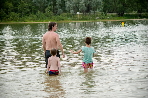 istock walking deeper in the lake 1449616422