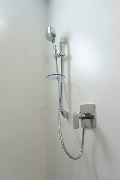 istock stainless steel shower head in new bathroom. 1449616545