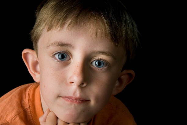 Cute six year old boy stock photo