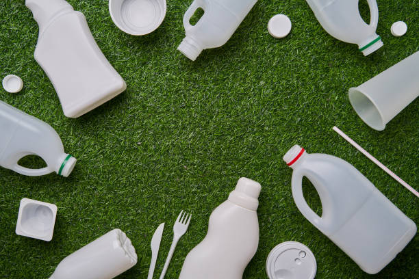 istock Plastic collected for recycling on green grass background. 1449617069