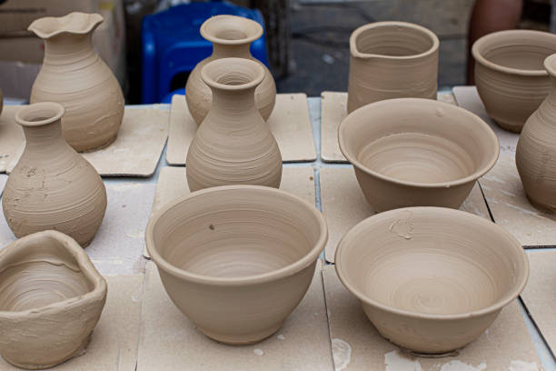istock raw ceramic bowls made from white clay waiting for putting in the pottery kiln. 1449617174