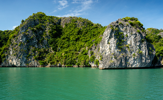Lan Ha & Ha Long Bay as accessed via the tropical paradise of Cat Ba Island, Vietnam in southeast Asia.