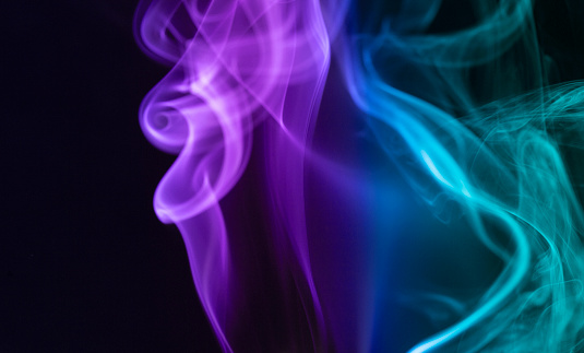 Abstract background with purple and blue smoke swirls