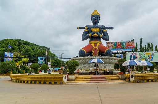 Battambang, Cambodia – August 08, 2022: The lost stick Lok Ta Dambong Kra Nhoung Shrine
 statue in Battambang on a gloomy day
