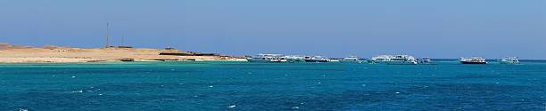 Ships at the island coast in Egypt Ships at the island coast in, Giftun Island, Egypt truism stock pictures, royalty-free photos & images