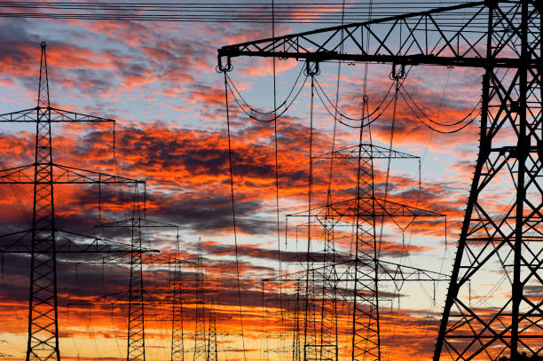istock pylons and high voltage cable for electricity and energy 1449628950