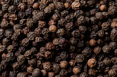 Dry black pepper seasoning macro image