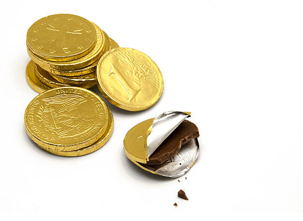 Chocolate golden coins isolated on white background