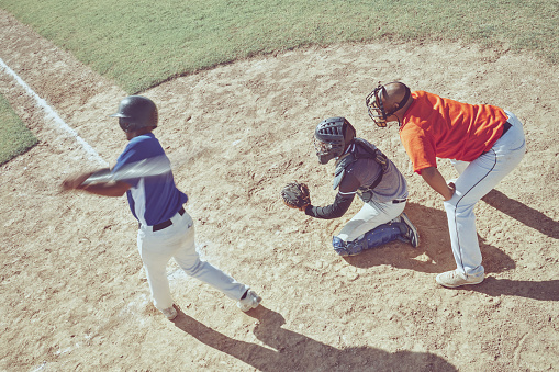 Baseball, pitch and sports game bat at training, exercise and workout on an outdoor field. Fitness and cardio of athlete teamwork and baseball player exercising with sport collaboration together