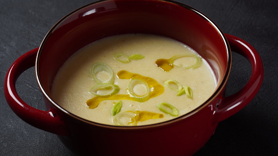 Vichyssoise, classic French chilled cream soup  - potato leek, and  onion topped with chopped chives