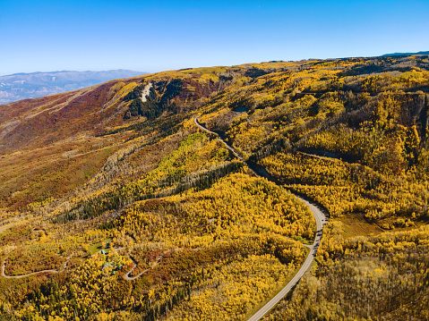 Colorful Trees and Forestation, Roads and Lakes in Western Colorado Grand Mesa National Forest Autumn Scenery on a Sunny October Day Budget Vacation Aerial Roadway Photo Series