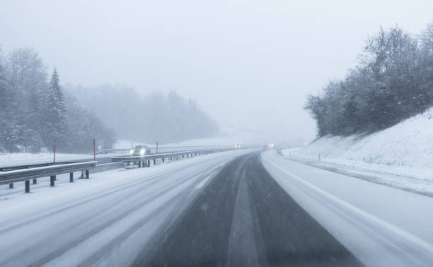 istock The first snow on the road 1449648188