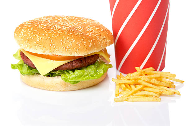 istock Cheeseburger, soda drinks and french fries 144965195