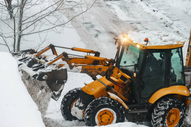 istock Tractor shoveling snow on the street. 1449657290