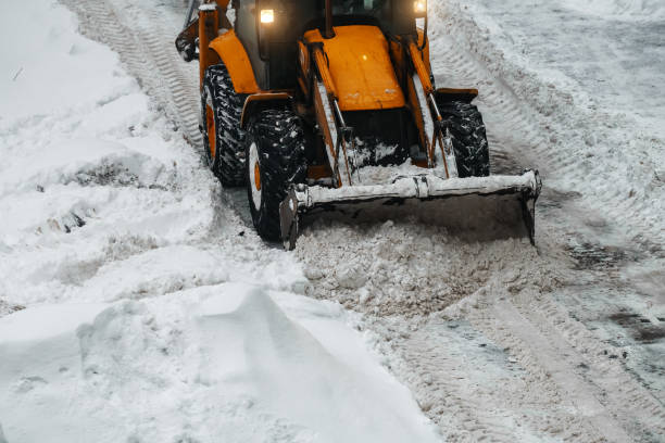 istock Tractor shoveling snow on the street. 1449657295