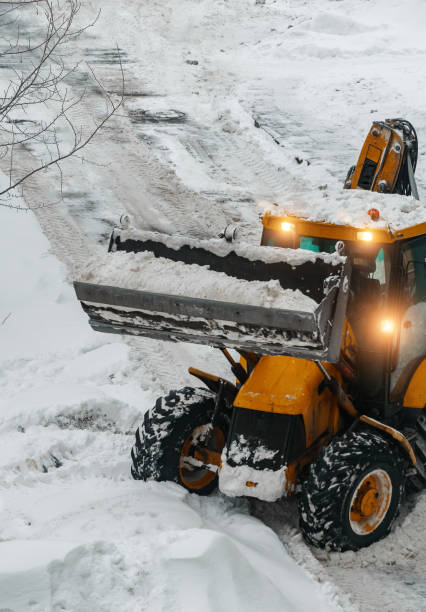 istock Tractor shoveling snow on the street. 1449657296