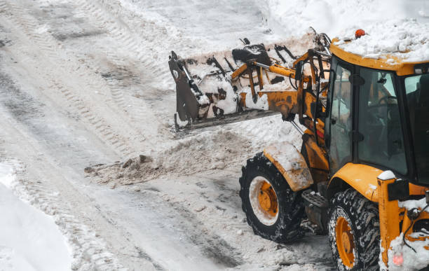 istock Tractor shoveling snow on the street. 1449657298