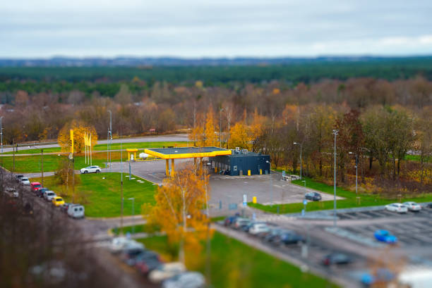 istock Gas station on the street in fall. 1449657320