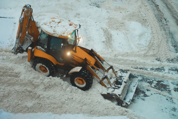 istock Tractor shoveling snow on the street. 1449657336