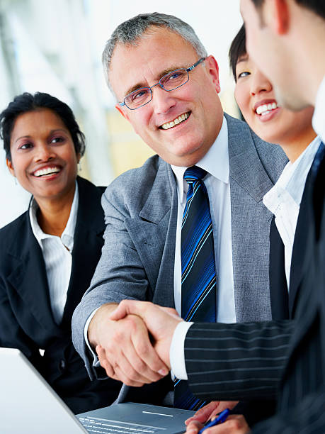 Businessmen shaking hands Businessmen shaking hands mergers and acquisitions photos stock pictures, royalty-free photos & images