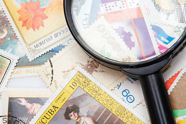 istock collection of stamps and magnifying glass 144966407