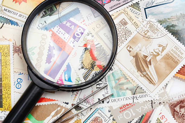 istock collection of stamps and magnifying glass 144966408