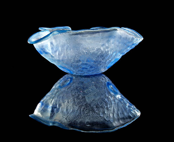 Blue glass bowl and refletion