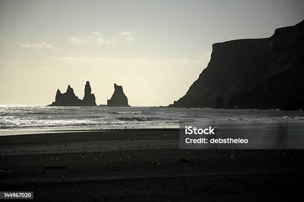 Silhouetted Sea Stacks Stock Photo - Download Image Now - Architectural Column, Atlantic Ocean, Back Lit