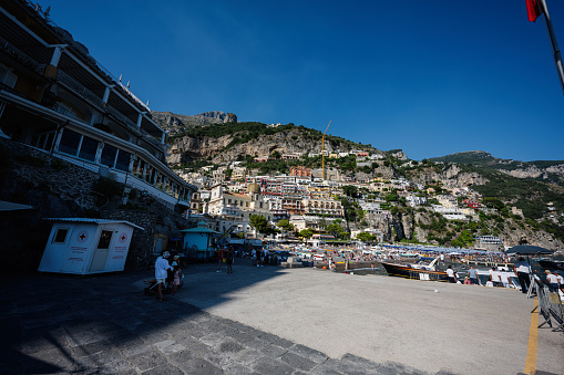 Tourists on Tyrrhenian sea, Amalfi coast, Positano, Italy.
