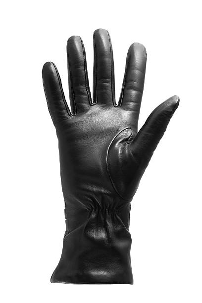 Black glove gesticulating stock photo