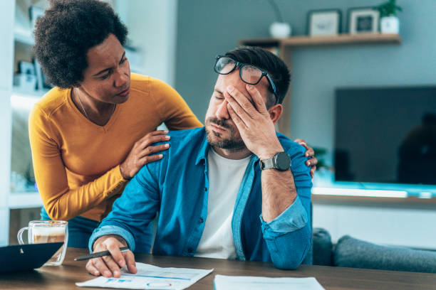 istock Couple doing their budget at home 1449673472