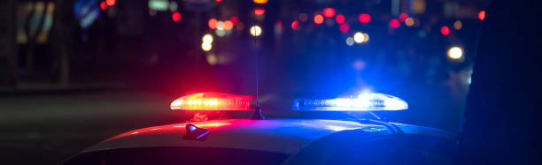 istock Police car with flashing lights on 1449675006