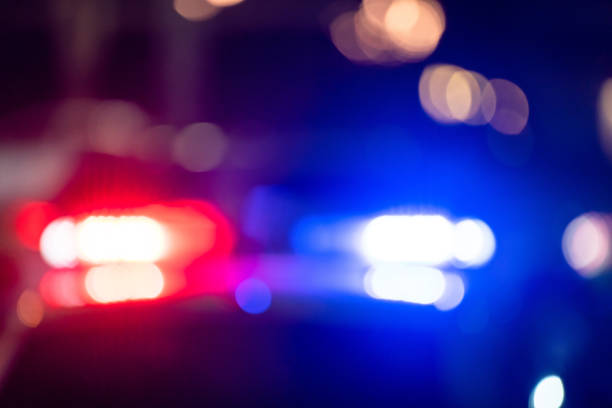 istock Police car with flashing lights on 1449675054