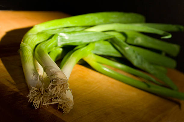 istock Green Onions on Wood 144968017