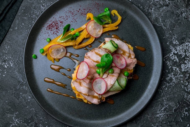 istock Bruschetta with roast beef on dark plate top view 1449681085